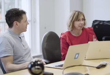 Catherine Kearns in a meeting with Scott Meintjes