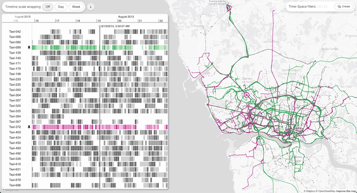 Geospatial visualization with pink and green taxi routes