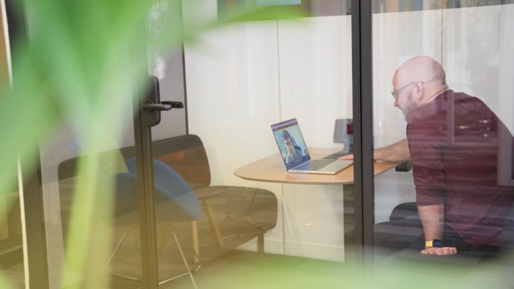 Cambridge Intelligence employee connecting with colleagues virtually